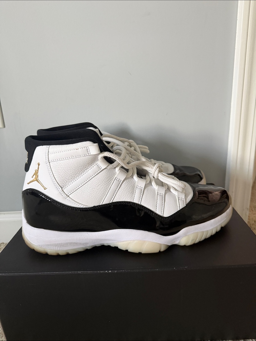 Jordan Men's White and Black High-Top Sneakers with Gold Jumpman